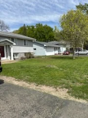 Residential front and side lawn on a corner lot.